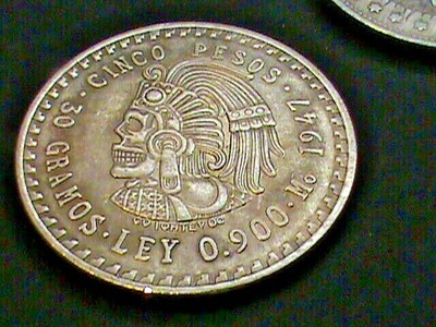 1947~Cinco Pesos Obverse~DESIGN~2 Headed Skull~1921~Morgan Dollar Obverse DESIGN