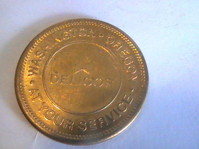 TOKEN DELICOR WASHINGTON OREGON TOKEN AT YOUR SERVICE ONE DOLLAR TOKEN