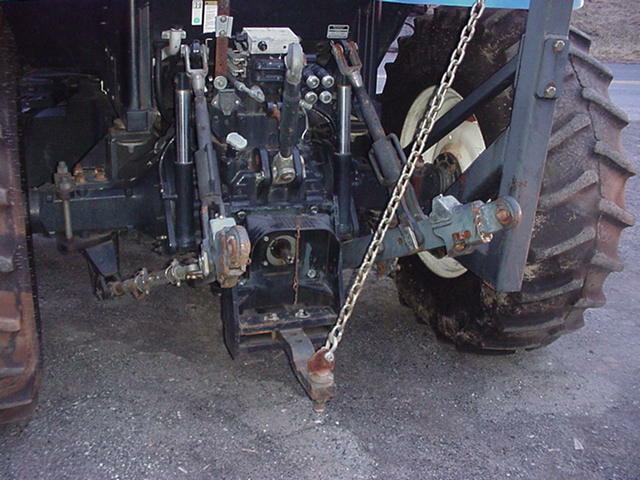 2005 NEW HOLLAND TS115 TRACTOR W/ ALAMO MACHETE BOOM MOWER BUSH HOG