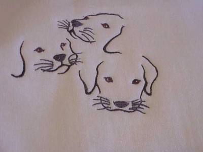 youth size sweatshirt embroidered with a trio of puppy faces