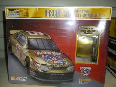 REVELL 4130- NASCAR 50TH ANNIV GOLD CHEVY MODEL KIT SKILL 2- NIB S1