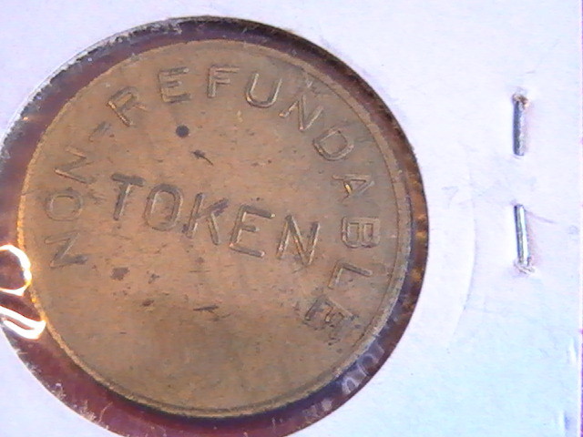 TOKEN REGINA'S MOVIES NON-REFUNDABLE BRASS 1 INCH