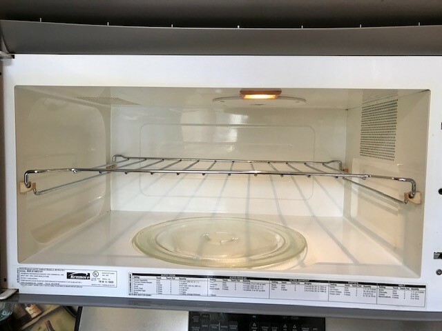 The Microwave and Hood combination in Stainless Steel