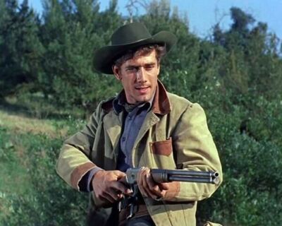 Robert Fuller as Jess Harper points rifle Laramie TV 8x10 inch photo