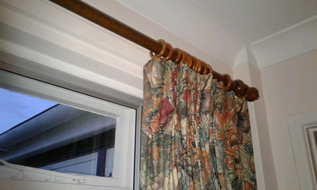 2 Dark Wood Curtain Poles With Bulbous Ends In Wareham Dorset