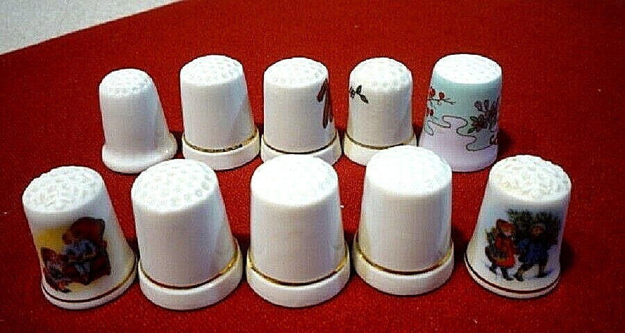 Ten vintage porcelain thimbles with designs. Collectible thimbles