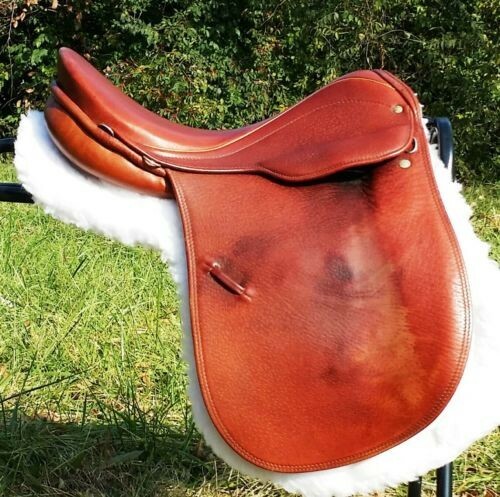 Courbette 17 inch English dressage saddle with leathers