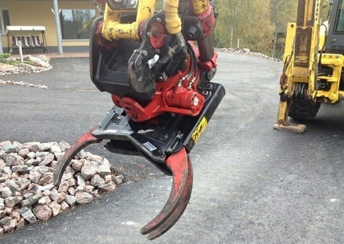 2006 New Holland LB115B-4PS Backhoe Loader with Buckets and Accessories