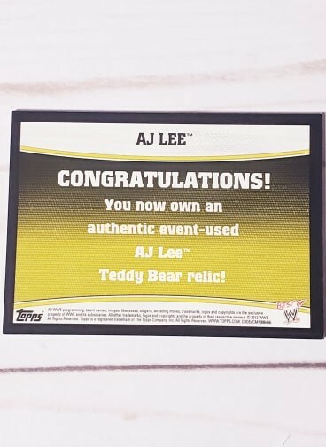 2013 Topps Best of WWE ''AJ Lee'' Teddy Bear Photo Shoot Relic