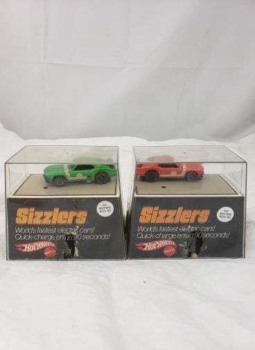 Two Vintage Hot Wheels Sizzlers 1969 Mustangs Red & Green +Original Cases & Pump