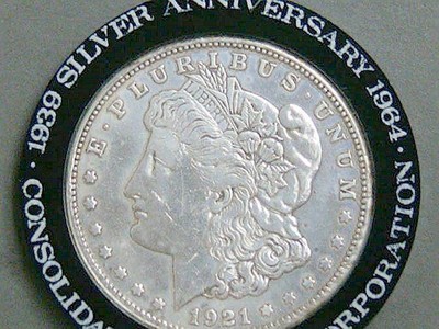 U. S. SILVER DOLLAR ADVERTISING TOKEN CONSOLIDATED FOODS
