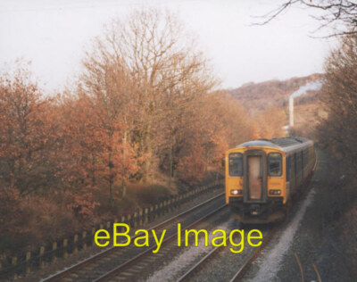 Photo 6x4 Lowfields cutting Elland A York-Manchester train in the cutting 2001