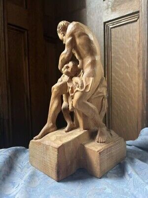 Vintage Hand Carved Figures of a Man and a Cherub