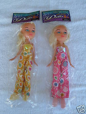 2 Fashion Dolls dress with patterned pants - Brand New 