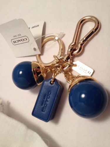 Coach conciencia llaveros, anillos y estuches para hombres