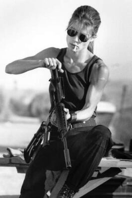 Linda Hamilton Terminator 2 Sarah Connor with cigarette & gun 8x10 inch photo