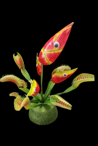 Artificial Venus Fly Trap and little creatures plant garden. Carnivorous Plants