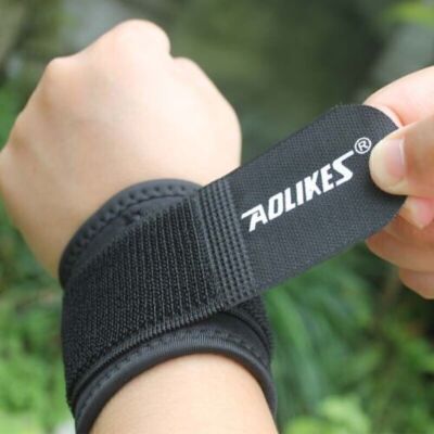 Wrist Brace Sports Band Wrap Adjustable Support Gym Strap Carpal Tunnel Bandage.