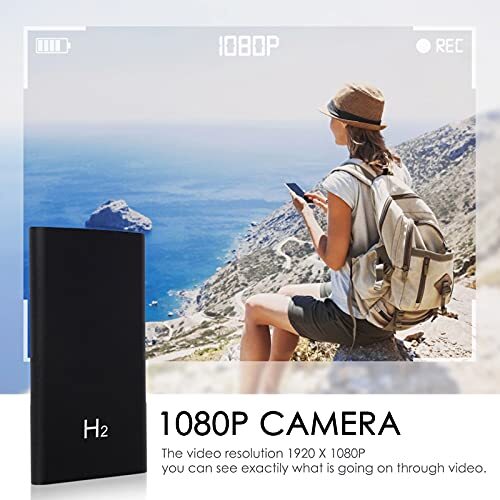 Hiker recording scenic view with 1080p camera.