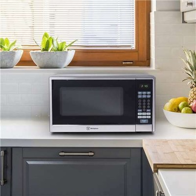 Westinghouse 1.1 Cubic Feet 1000 Watt Counter Top Microwave Oven, Silver (Used)