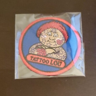 GARBAGE PAIL KIDS 2022 BOOK WORMS TATTOO LOU PATCH