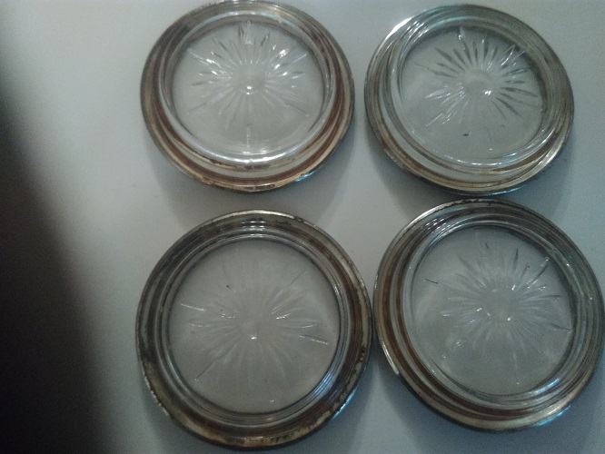 silver platted coasters made in Italy 4 of them