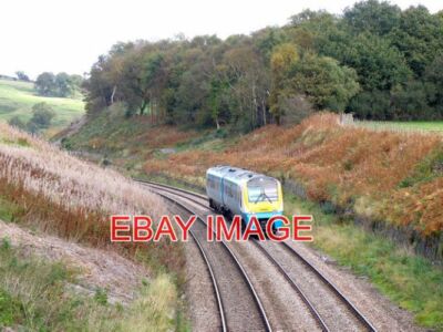 PHOTO  A SOUTHBOUND TRAIN HEADS TOWARDS ABERGAVENNY. THE MARCHES LINE