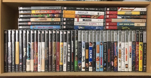 PSP Playstation system , Cases and 70+ UMD Games / Videos Lot