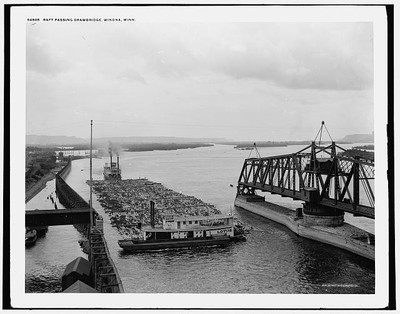 Photo:Raft passing drawbridge, Winona, Minn.