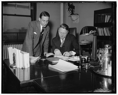 Photo:Wm. O. Douglass, Commissioner of S.E.C. and his Asst. Abe Fortos
