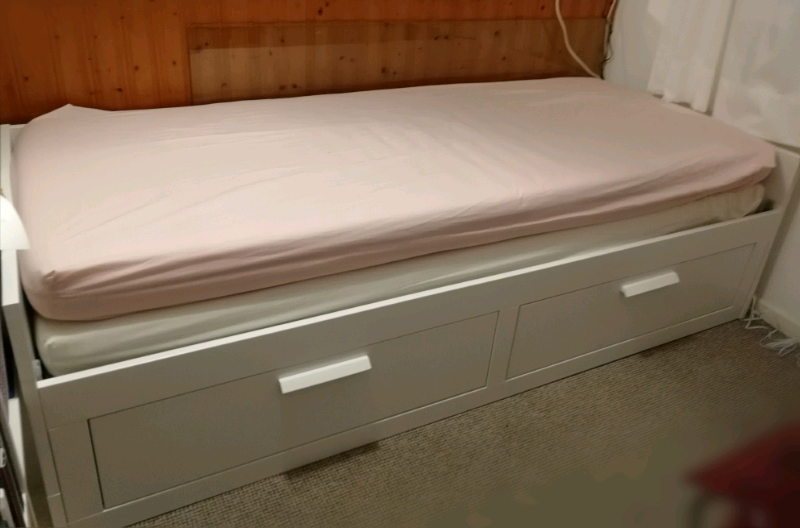 Ikea Brimnes day bed/pull out bed with 2 Malfors single mattresses in