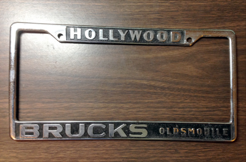 1966-67 Vintage Hollywood CA Brucks Oldsmobile License Plate Frame