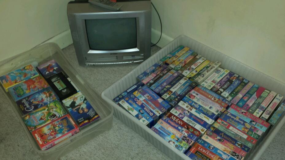 TV with built in VCR and DVD Player Plus Over 80 Kids Videos (including