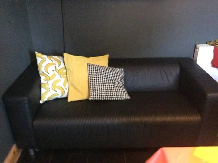 Ikea Klippan black leather look sofa. Like new in Sheringham, Norfolk