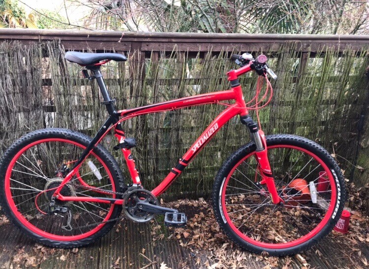 black and red specialized mountain bike