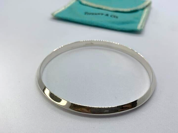【ユーズド品】TIFFANY　Knife Edge Bangle　＊592 Tiffany Edge:Hinged Bypass Bangle in Platinum and Yellow