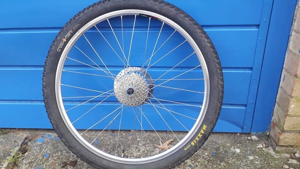 Mountain bike back wheel with disc,sprockets and tyre. Shimano/Mavic