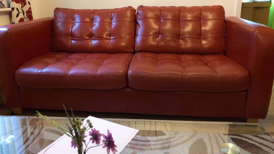 A set of 2 high quality red Italian leather sofas, one 3 seater and one