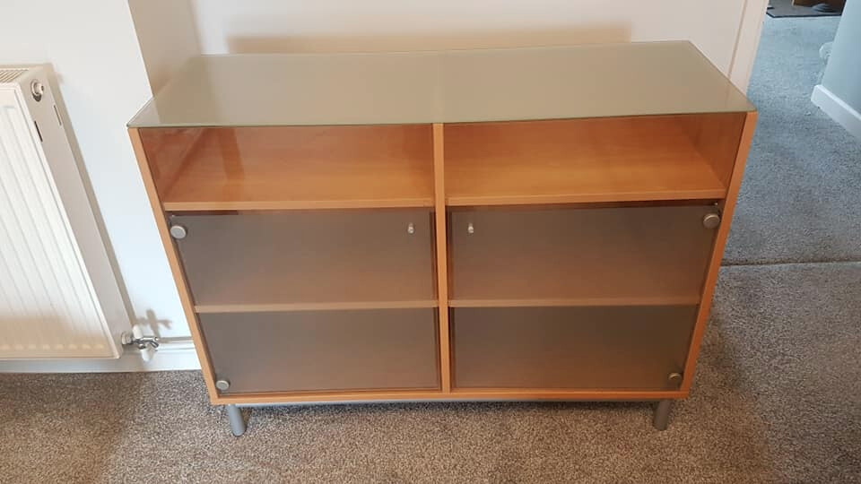 Ikea Sideboard in excellent condition. Glass doors / top, 'beech' base