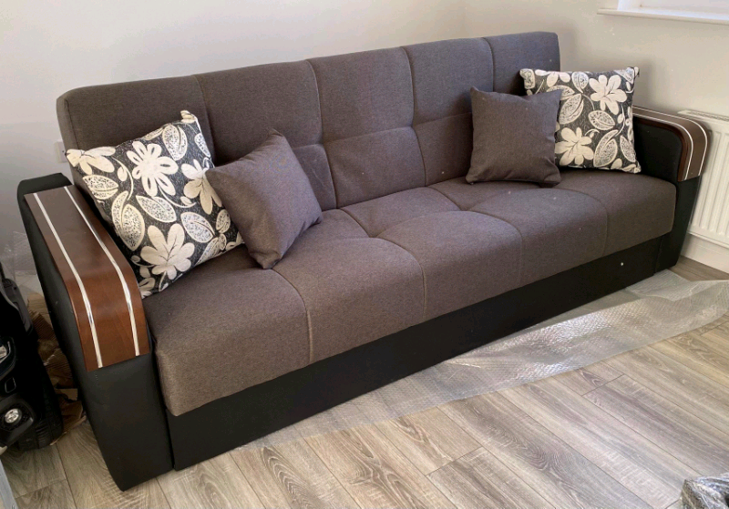 New Grey sofa bed with storage and pillows in Dunfermline, Fife