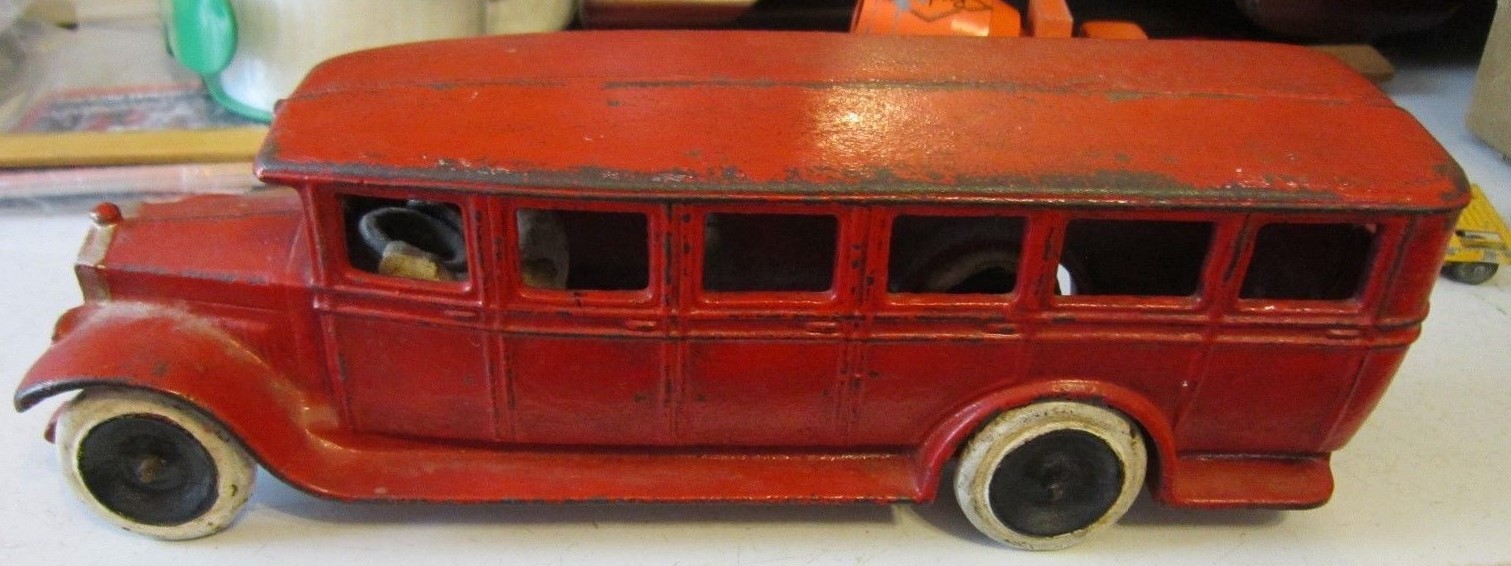 Vintage Red SKOGLUND & OLSON-SETO Cast Iron TOY BUS w/Driver c.1970