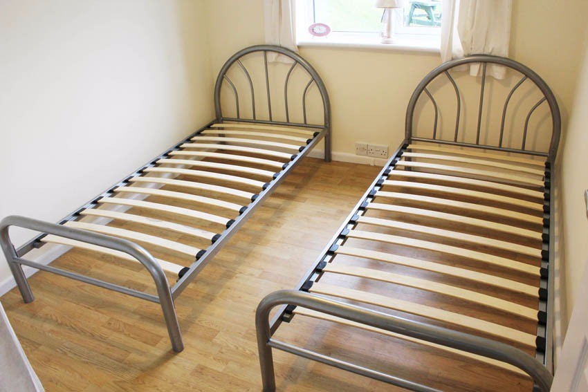 2 metal framed single beds with slats in Exeter, Devon Gumtree