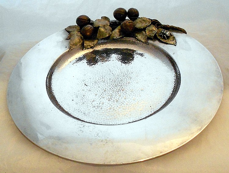 A hand-hammered sterling and mixed metals dish, Gorham, 1883