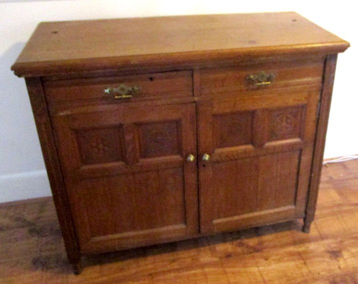 Antique with Carved doors probably oak. Available after house move in