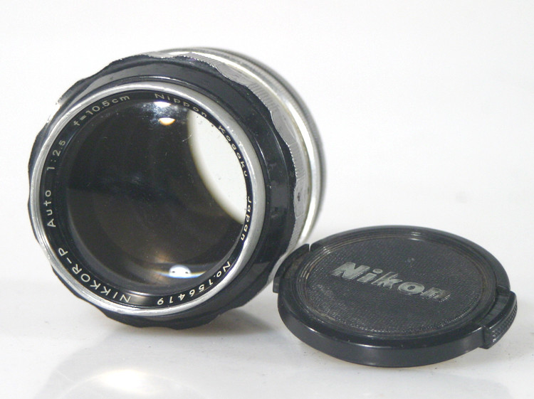 NIKON 105MM F2.5 NON-AI PRIME LENS WITH FRONT AND REAR CAPS