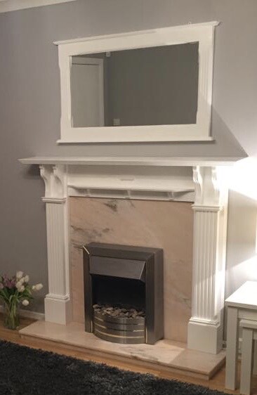 Marble And Painted White Fireplace And Mirror In Knightswood