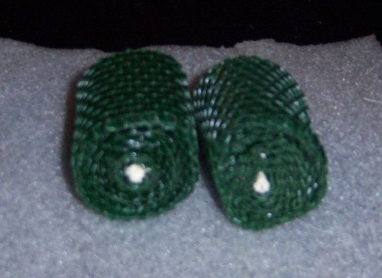 Pair of green colored beeswax candles 2” high 1 1/2” round