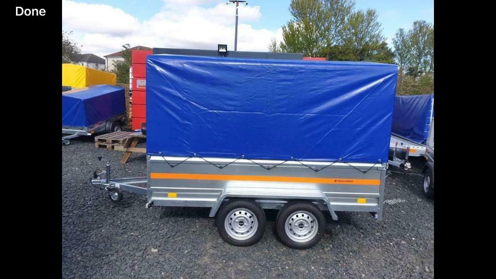 8.7x4.2 double axle trailer with 52cm side and frame and cover in