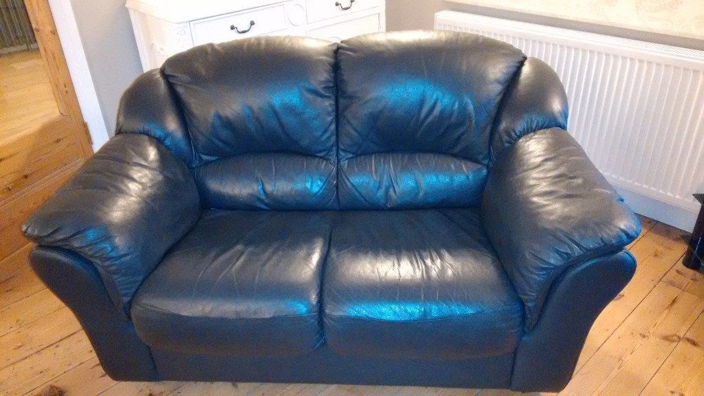 2 seater dark blue leather sofa, very good condition in Dorking