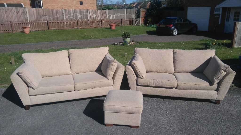 2 Marks and Spencer's Cream Sofas complete with matching pouffe in